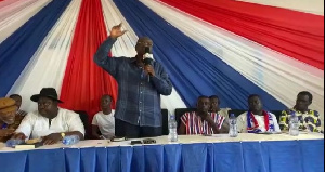 Asante Mampong MP Kwaku Ampratwum-Sarpong addressing a party gathering