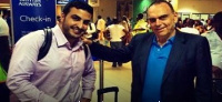 Avram Grant with his agent Saif Rubiea