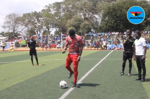 Asamoah Gyan performing the ceremonial kick off