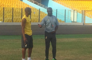 Coach Kwasi Appiah (R) and Black Stars Captain Dede Ayew (L)