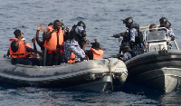 Ivorian sailors participate in an anti-piracy hostage rescue scenario with the Ghanaian Navy