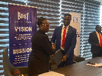 Head of Legal at BOST Madam Harriet Amoah and Education Minister Dr Yaw Osei Aduwtwum in shot