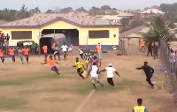 Referee runs for his life