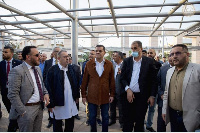 PM Abdul-Hamid Dbeibah with officials at Tripoli University