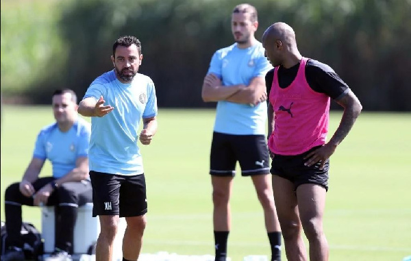 Black Stars Captain, Andre Dede Ayew and his coach Xavi Hernandez