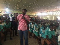 Actor John Dumelo addressing students of Ahafoman Secondary Technical