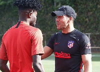 Partey interacting with Simeone after returning from holidays