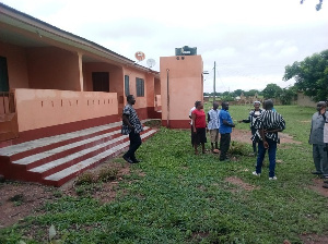 Agnes Anamoo, the DCE for Nabdam and her entourage inspecting one of the health facilities