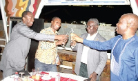 Doctors honouring Prof Frimpong Boateng at a dinner held in his honour