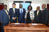 Officials of OPIC, CalBank, Citibank after signing the deal