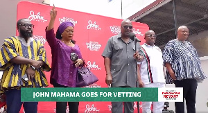 John Mahama (middle) addresses a gathering after his vetting at the party headquarters