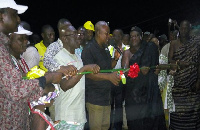 Nana Conduah assisting President Mahama to commission the projects.