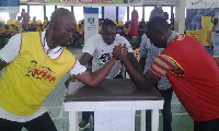 Armwrestling battle between two men.