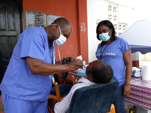 Dentists treating a patient