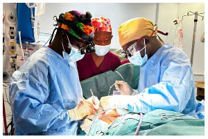 Group of doctors performing the first Coronary Artery Bypass Surgery at the UGMC