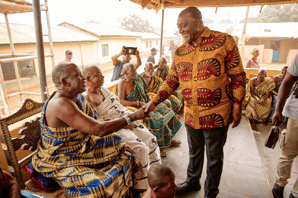 Alan John Kwadwo Kyerematen  with some members of the community