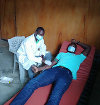 Photo of doctor attending to a donor