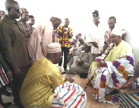 Vice President Dr Mahamudu Bawumia kneeling before the chief