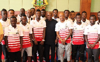 Former President John Dramani Mahama with Black Stars players