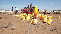 People queue for water in drought-hit Northern Kenya