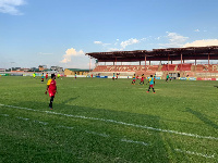 A wide shot of the players training