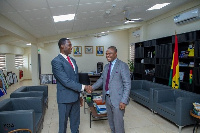 Minister of Education, Yaw Osei Adutwum with new Acting Director General of the GES, Eric Nkansah