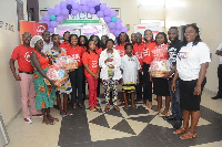 Officials of Barclays with some of the nursing mothers at the NICU