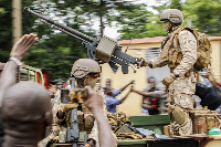 The mutinying soldiers were cheered by crowds as they reached the capital Bamako on Tuesday