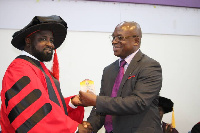 Paul Asare Ansah [L] receiving award at the global leadership conference