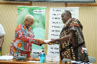 Nana Otuo Siriboe, the Chairman of the Council, presented the cash to Reverend Dr Joyce Aryee