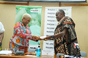 Nana Otuo Siriboe, the Chairman of the Council, presented the cash to Reverend Dr Joyce Aryee