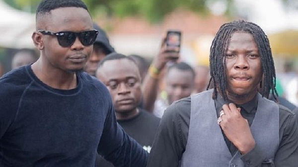 Dancehall artiste, Stonebwoy with his former manager Blakk Cedi