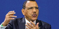 Mohamed Bazoum, pictured here seven months before the coup, was stripped of his immunity in June