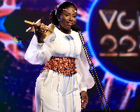 Gospel Artiste, Diana Hamilton with her award