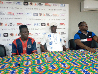 A player and some officials of Legon Cities