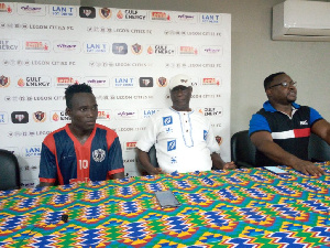 A player and some officials of Legon Cities