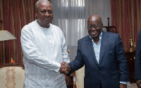 President John Mahama in a handshake with Nana Akufo-Addo