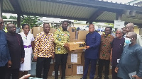 Ablakwa (fifth right) presents an equipment to the medical superintendent