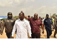 Former President John Dramani Mahama waves constituency members