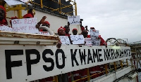 MODEC workers showing placards