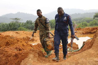 File photo of security personnel at an illegal mining site