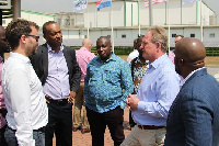 Mr. Kweku Awotwi (2nd left) in a discussion with guests after tour.