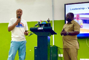 Andre Ayew (left) and Dr. Collins Badu Agyemang (right)