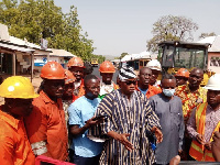 Savannah Regional Minister Mr Saeed Muhazu Jibri inspecting the ongoing road project in Damongo