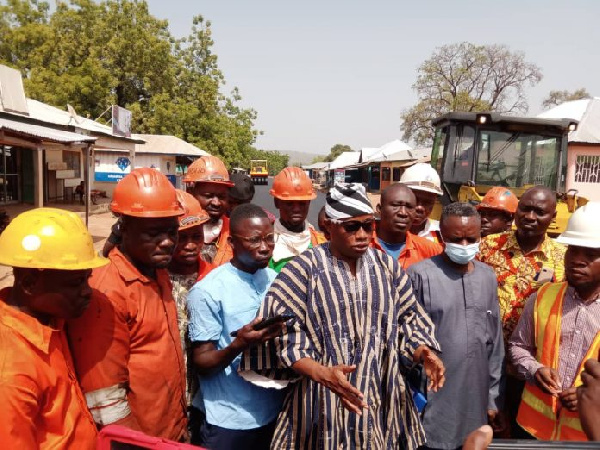 Savannah Regional Minister Mr Saeed Muhazu Jibri inspecting the ongoing road project in Damongo