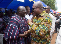 Former President John Dramani Mahama in a handshake with Vice President, Mahamudu Bawumia