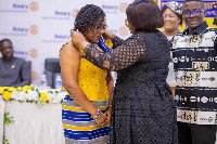 Matilda Adukuma Adomolga-Adageba receiving the official Chain of Office from Nana Esi Adade Amankwah