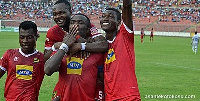 Captain Amos Frimpong of Kotoko been mobbed by his team mates