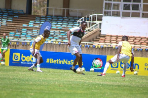 Kenya captain Wanyama up against Nyakeya and Bernard Ochieng during the team's training