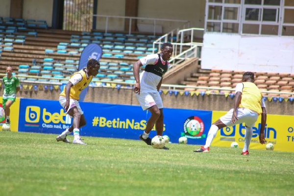 Kenya captain Wanyama up against Nyakeya and Bernard Ochieng during the team's training